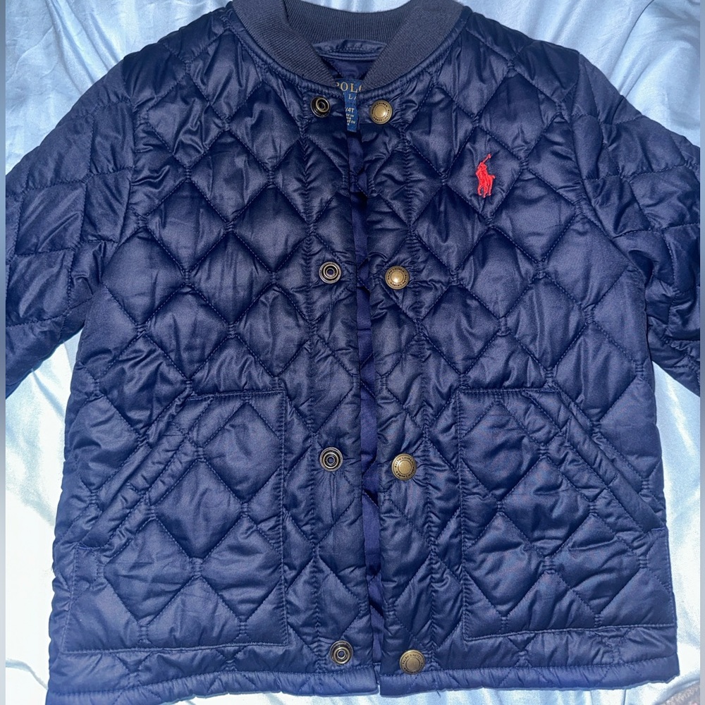 Blue quilted polo jacket . Worn twice